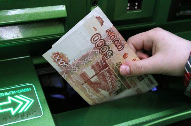 РБК: денежные переводы из РФ в соседние страны уменьшились на треть - «Бизнес»